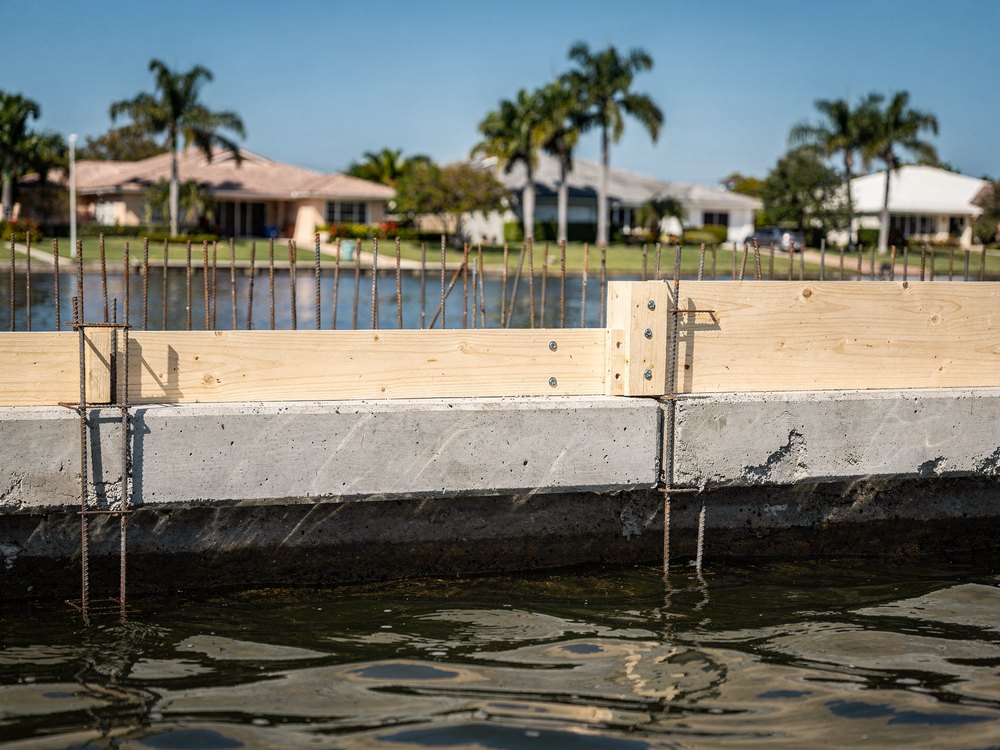 Marine contractor inspecting a seawall in Tampa Bay